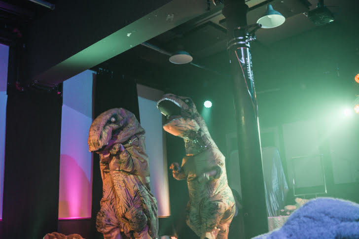 Performers in dinosaur costumes. Urban Artifact, Northside, Cincinnati. February 2020.