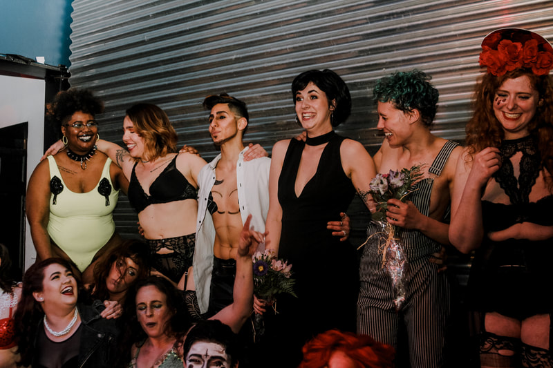 Smoke & Queers Burlesque Troupe group photo at Mixwells Northside in Cincinnati, Ohio. April 2019.